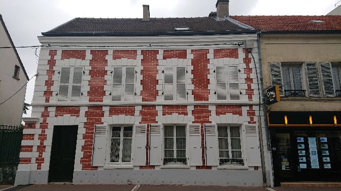 Maison en « trompe l’oeil de briques »